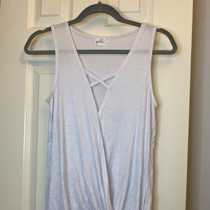 White top with crisscross in the front
